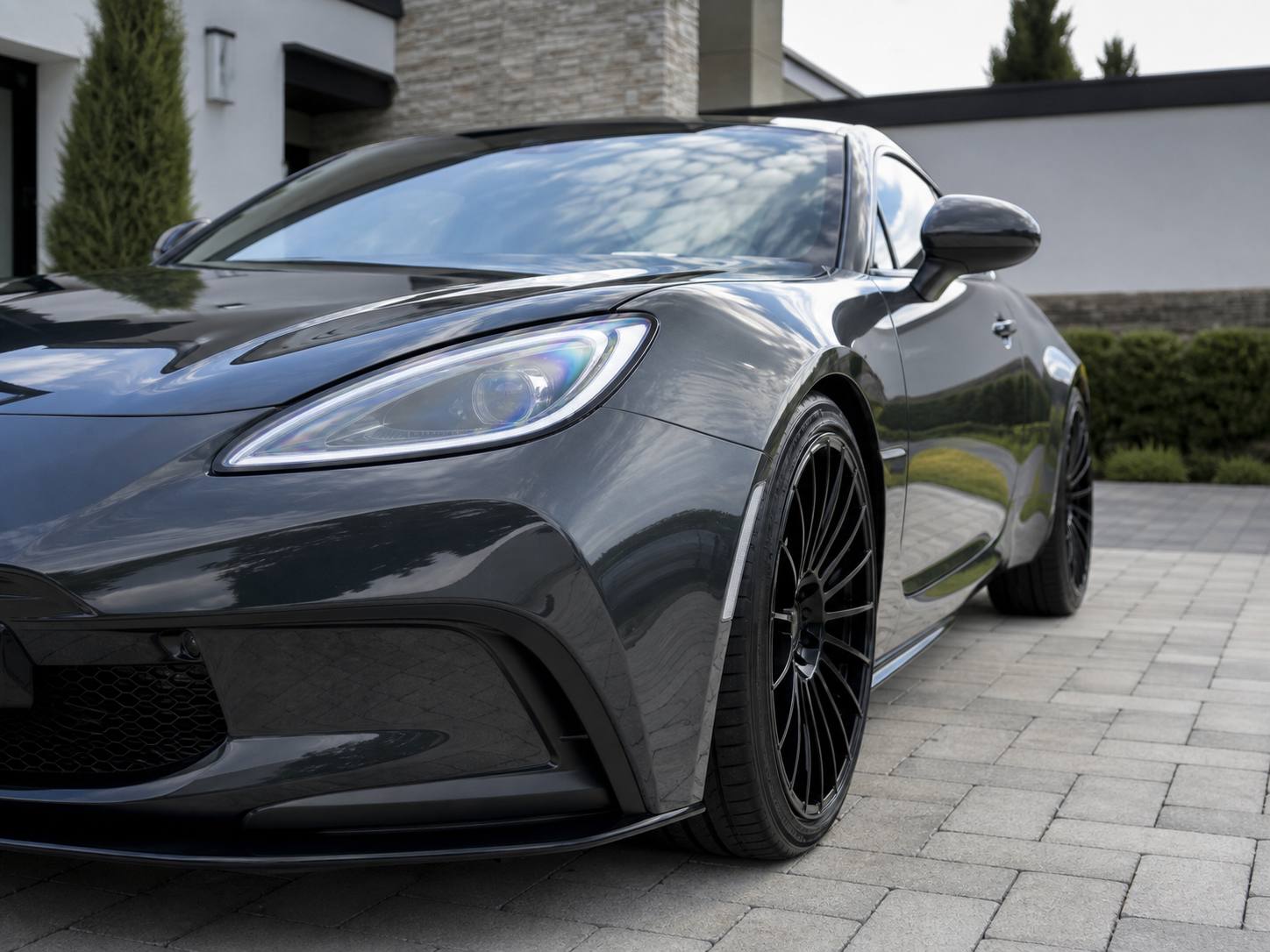 A coupe reflecting studio lighting after correction